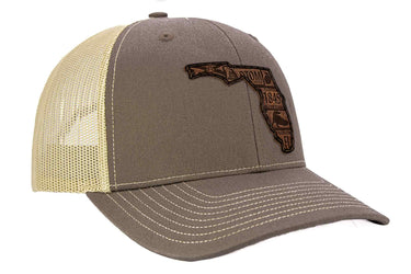 Florida Map Leather Patch Trucker Hat. Burnished Full Grain Leather. Snapback Trucker Hat. Richardson 112 Cap. Florida State Headwear.