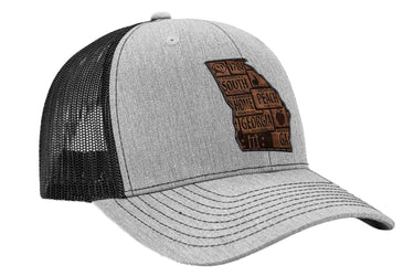 Georgia Map Leather Patch Trucker Hat. Burnished Full Grain Leather. Snapback Trucker Hat. Richardson 112 Cap. Georgia State Headwear.