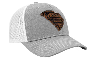 South Carolina Map Leather Patch Trucker Hat. Burnished Full Grain Leather. Snapback Trucker Hat. Richardson 112 Cap. SC State Headwear.