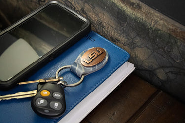LSU Tigers Oval Camo Leather Key Fob. Split Ring and Durable Stitching. Perfect Collegiate Key Chain Gift. Old School Camo Key Chain.