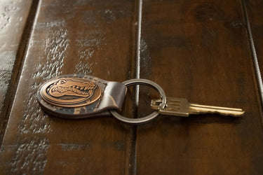 Florida Gators Oval Camo Leather Key Fob. Split Ring and Durable Stitching. Perfect Collegiate Key Chain Gift. Old School Camo Key Chain.