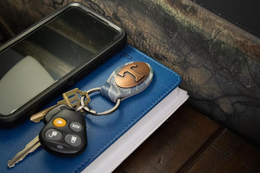 Tennessee Vols Oval Camo Leather Key Fob. Split Ring and Durable Stitching. Perfect Collegiate Key Chain Gift. Old School Camo Key Chain.