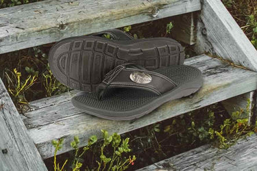 Redfish Men's Flip Flop Sandal. Casual Boat Show. Fishing Gift. Brown Straps With Metal Concho Logo. Cushioned Insole and Non-skid Outsole.