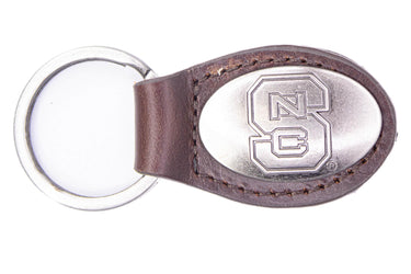 NC State Wolfpack Oval Leather Key Fob. Sturdy Split Ring and Durable Stitching. Perfect Collegiate Key Chain Gift. Brown or Black Leather.