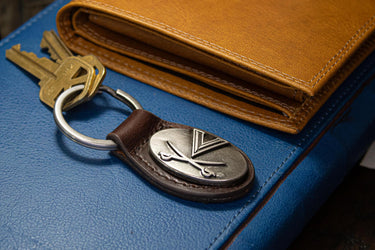 Virginia Cavaliers Oval Leather Key Fob. Sturdy Split Ring and Durable Stitching. Perfect Collegiate Key Chain Gift. Brown or Black Leather.