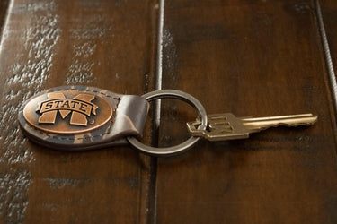 Mississippi State Bulldogs Oval Camo Leather Key Fob. Split Ring and Durable Stitching. Collegiate Key Chain Gift. Old School Camo Key Chain