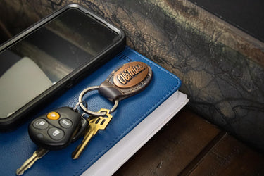 Ole Miss Rebels Oval Camo Leather Key Fob. Split Ring and Durable Stitching. Perfect Collegiate Key Chain Gift. Old School Camo Key Chain.
