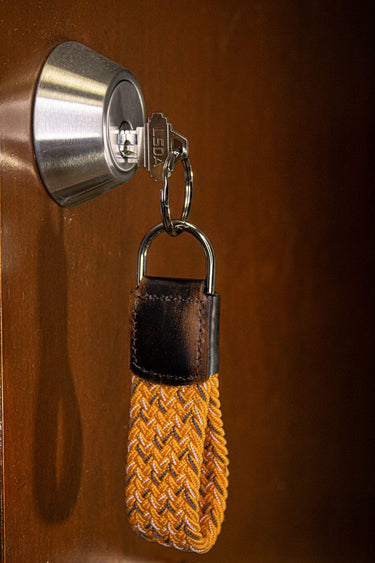 Braided Stretch Woven Orange and Gray Keychain with Leather Accent