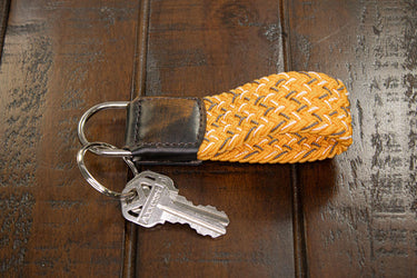 Braided Stretch Woven Orange and Gray Keychain with Leather Accent