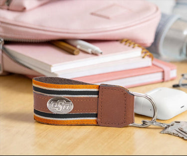 Oklahoma State Cowboys Collegiate Grosgrain Ribbon Key Chain with Leather Accent and Silver Emblem.