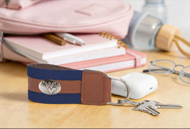 West Virginia Mountaineers Collegiate Grosgrain Ribbon Key Chain with Leather Accent and Silver Emblem.