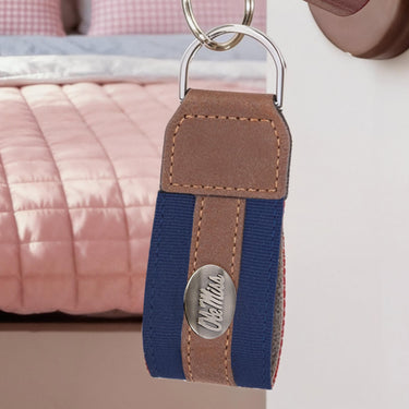 Ole Miss Rebels Collegiate Grosgrain Ribbon Key Chain with Leather Accent and Silver Emblem.