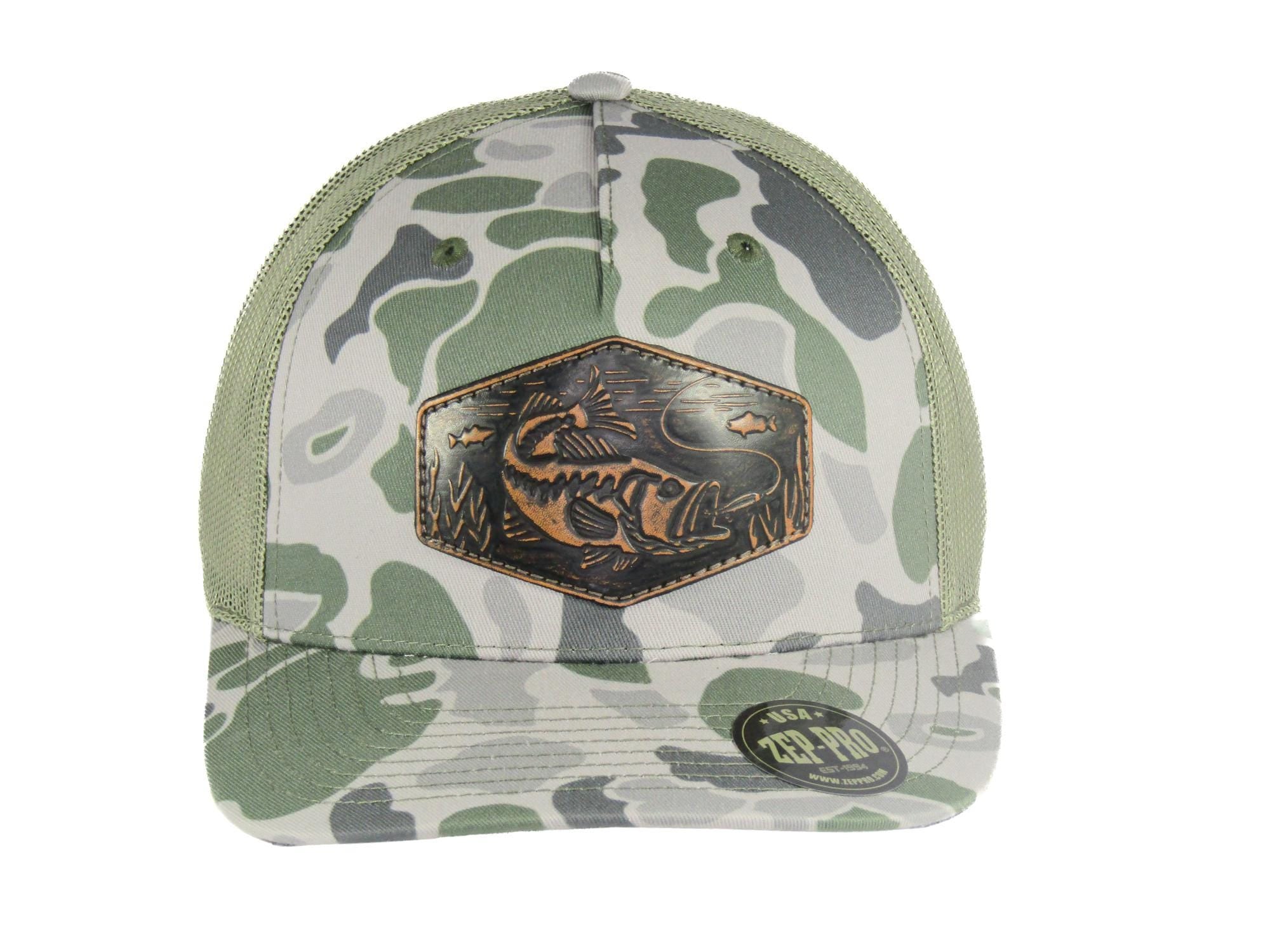 Bass Old School Camo Trucker Hat. Hand Burnished Full Grain Leather Patch. 5-Panel Richardson 112 Snapback Cap. Stitched Bass Leather Patch.