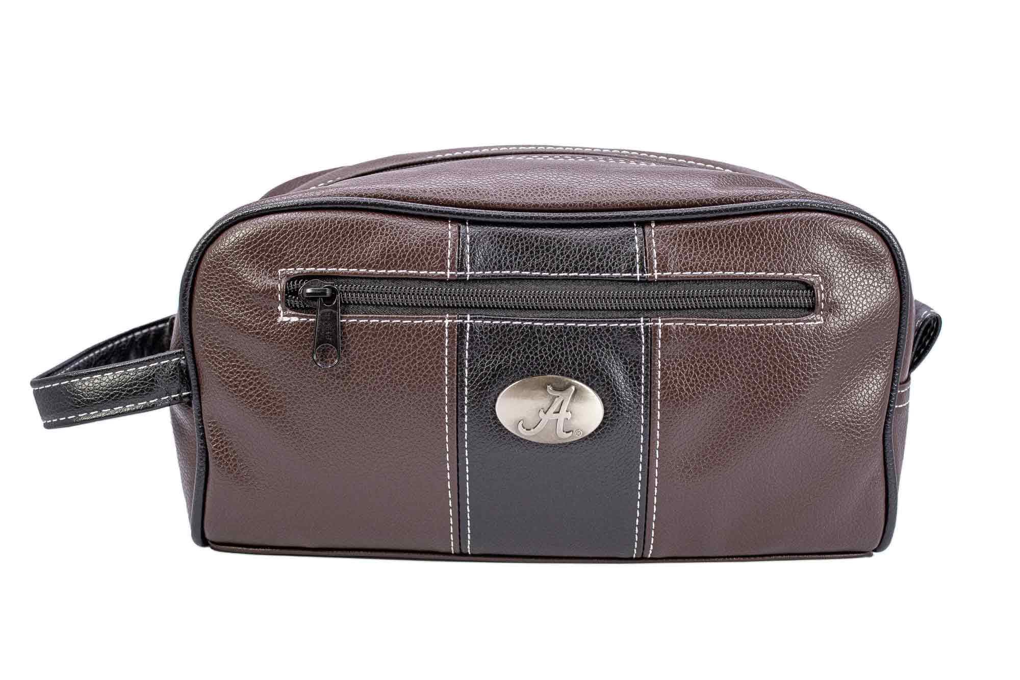 Alabama Crimson Tide Men's Toiletry Dopp Bag. Brown Pebble PU Finish. Bama Silver Logo. Durable Water Resistant. Compact Design.