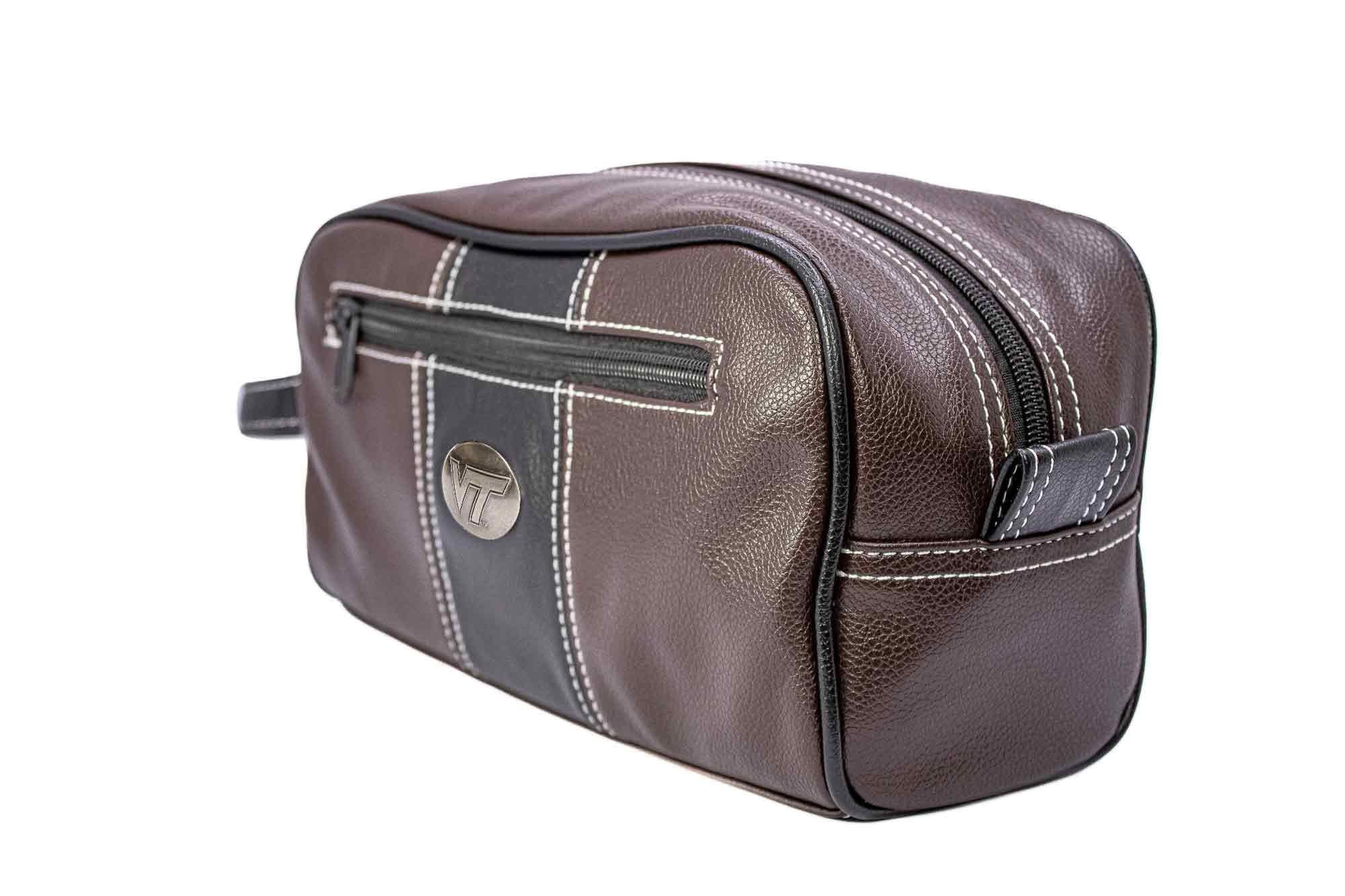 Virginia Tech Hokies Men's Toiletry Dopp Bag. Brown Pebble PU Finish. Hokies Silver Logo. Durable Water Resistant. Spacious Design.