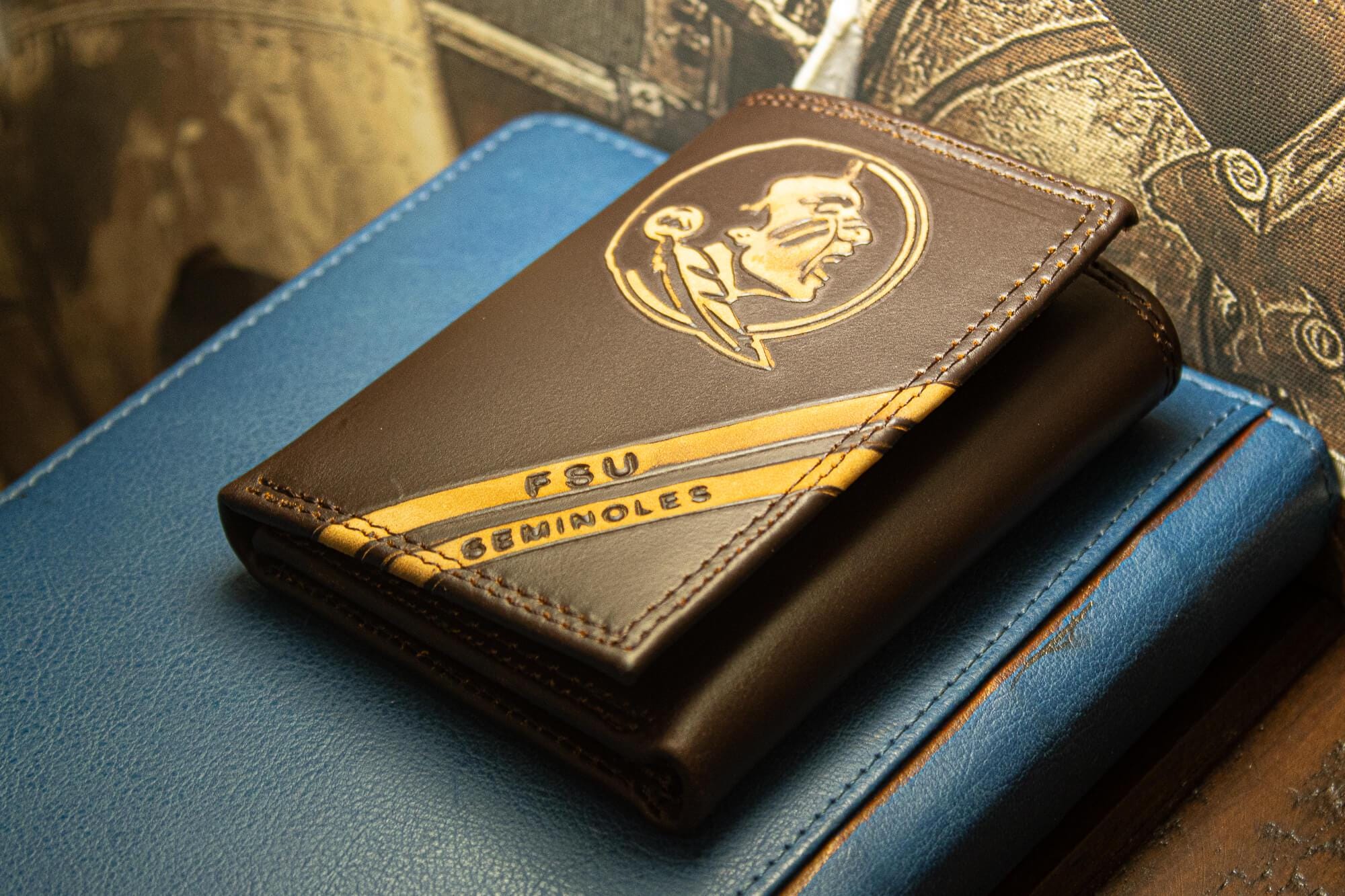 FSU Seminoles Men's Embossed Leather Wallet. FSU Trifold. FSU Secretary. Brown Collegiate Wallet. Seminoles Athletic Print.