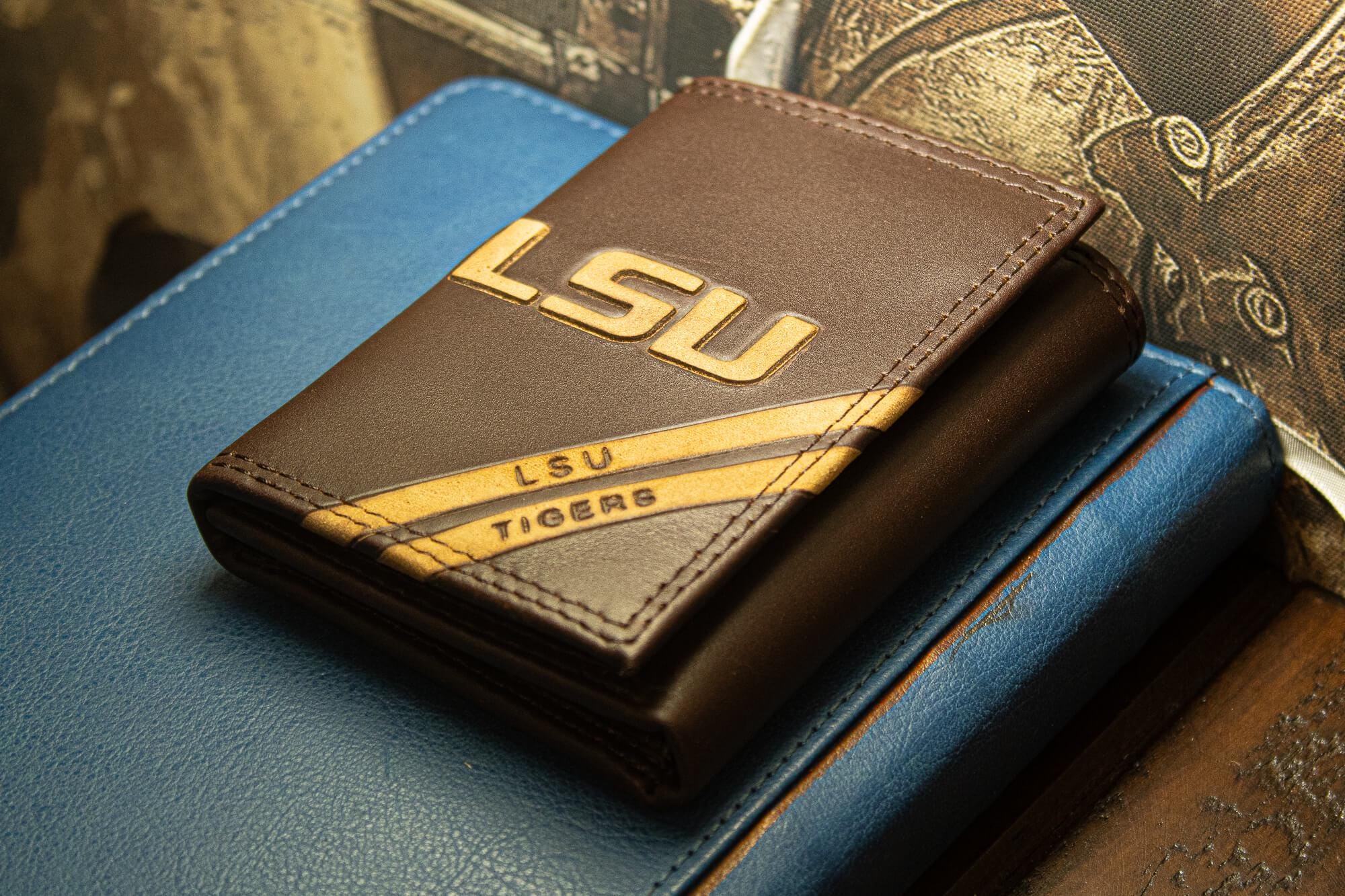 LSU Tigers Men's Embossed Leather Wallet. LSU Trifold. LSU Secretary. Brown Collegiate Wallet. Tigers Athletic Print.