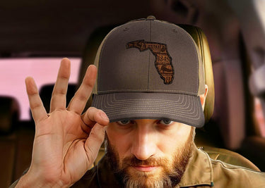Florida Map Leather Patch Trucker Hat. Burnished Full Grain Leather. Snapback Trucker Hat. Richardson 112 Cap. Florida State Headwear.