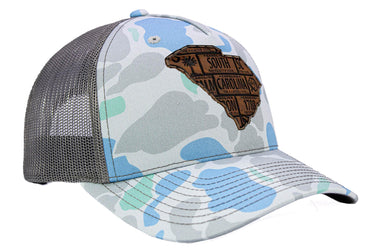 South Carolina Map Old School Camo Trucker Hat. Burnished Full Grain Leather Patch. 5-Panel Richardson 112 Snapback Cap. Stitched Map Patch.