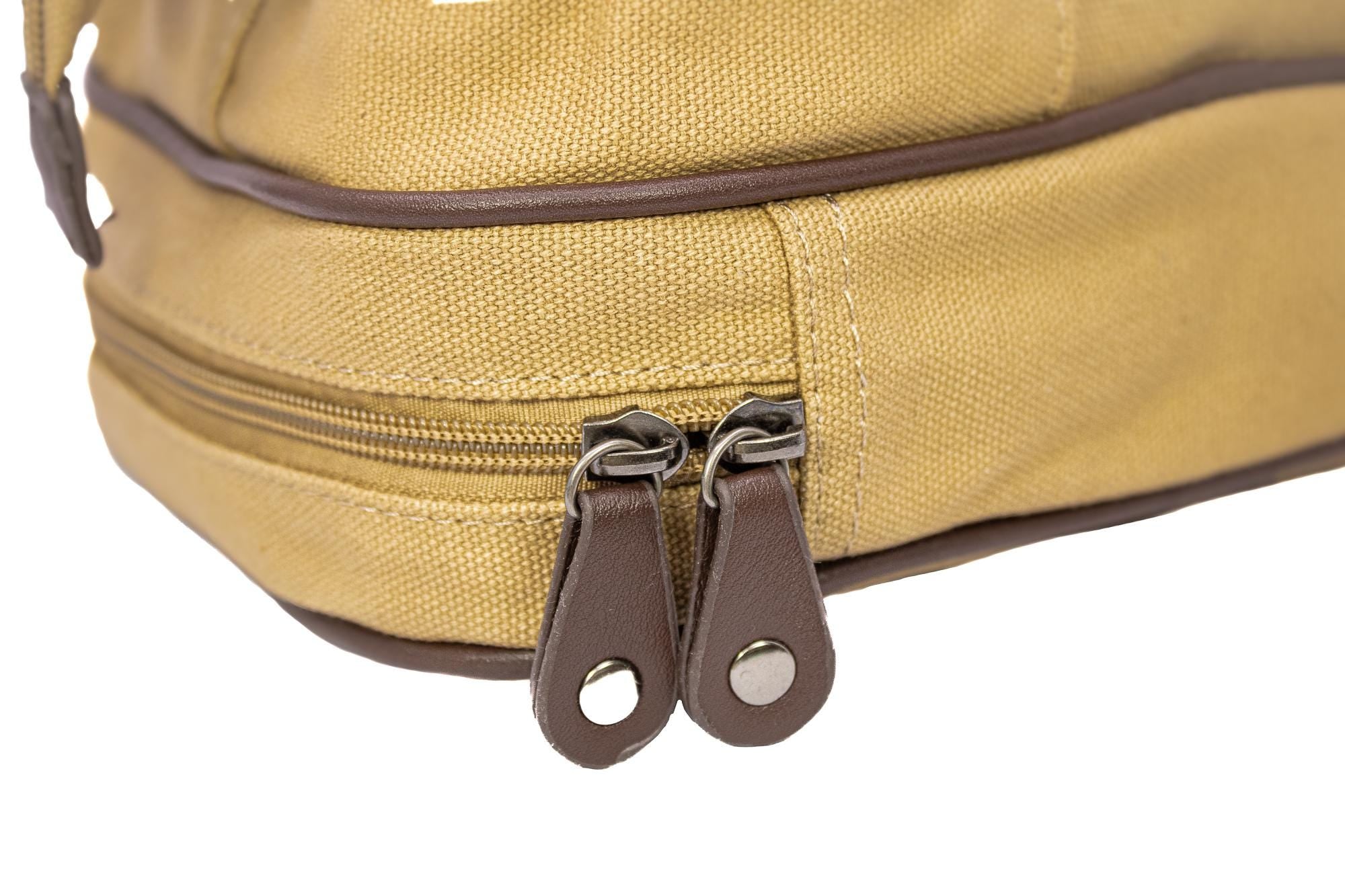 Ole Miss Rebels Men's Canvas Toiletry Bag. Durable Water Resistant Bag. Spacious Travel Design. Waxed Canvas Khaki Body. Ole Miss Gifts