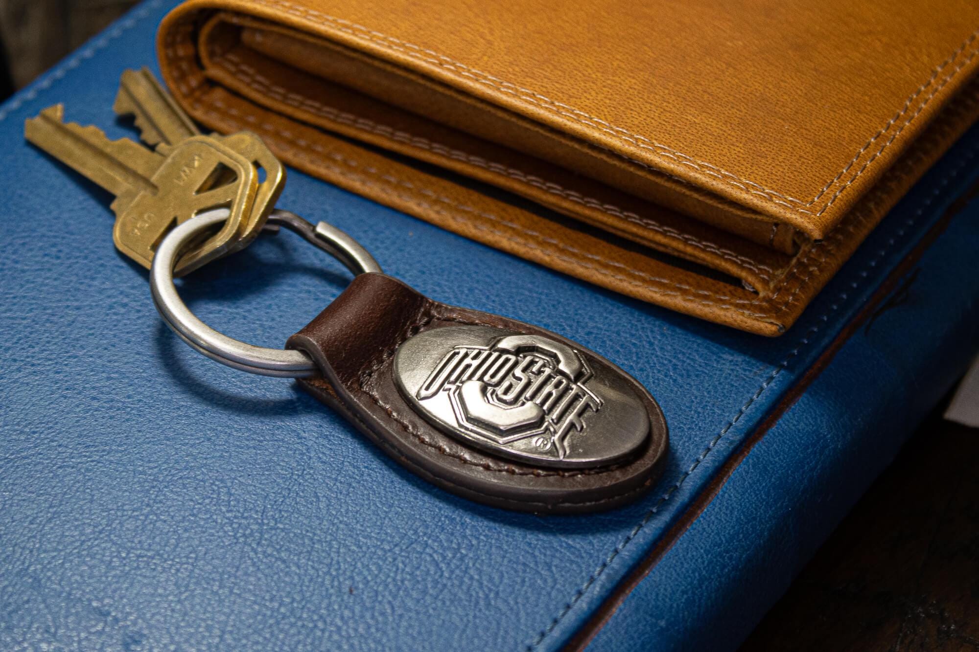 Ohio State Buckeyes Oval Leather Key Fob. Sturdy Split Ring and Durable Stitching. Perfect Collegiate Key Chain Gift. Brown or Black Leather