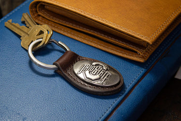 Ohio State Buckeyes Oval Leather Key Fob. Sturdy Split Ring and Durable Stitching. Perfect Collegiate Key Chain Gift. Brown or Black Leather