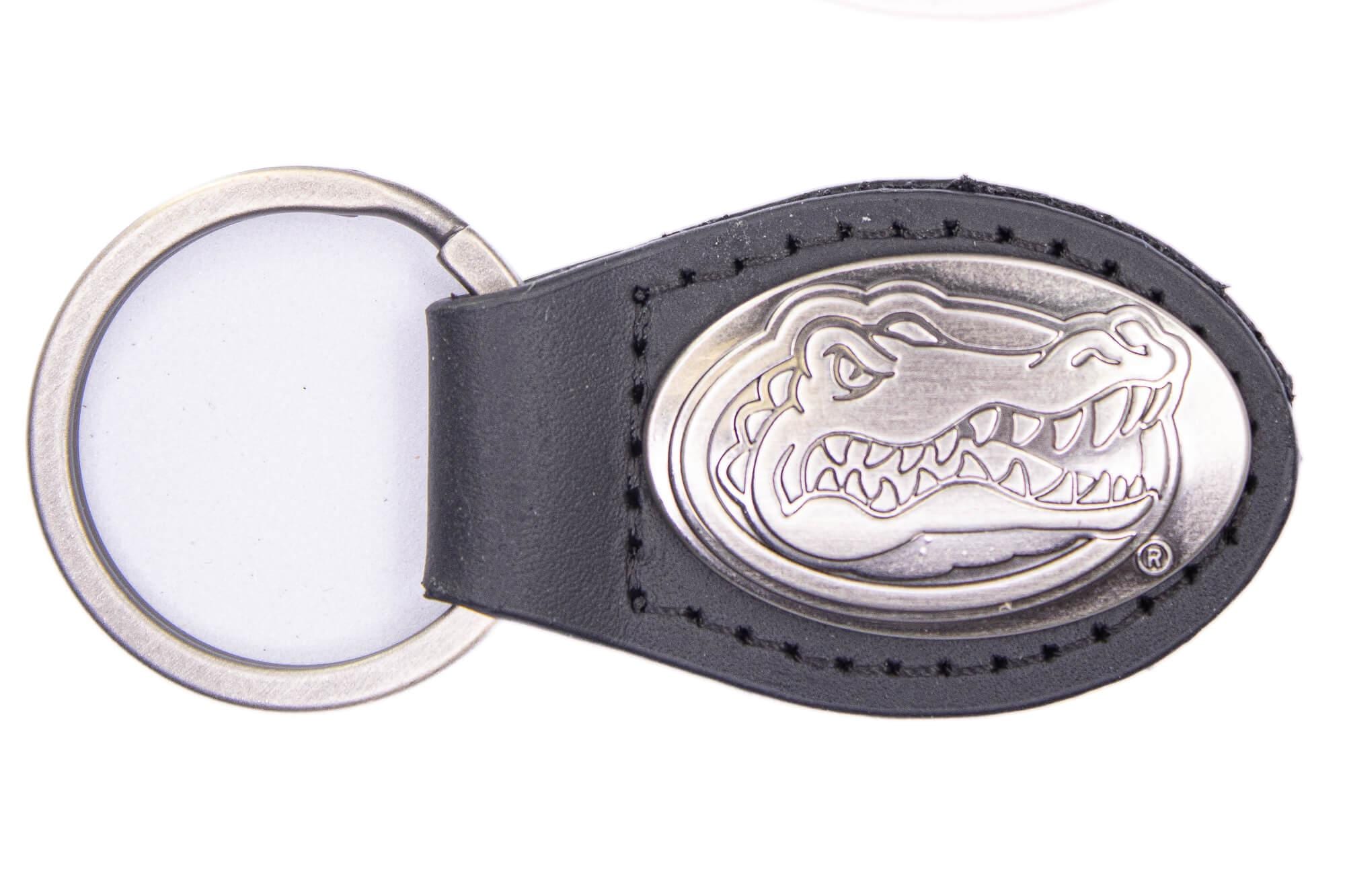 Florida Gators Oval Leather Key Fob. Sturdy Split Ring and Durable Stitching. Perfect Collegiate Key Chain Gift. Brown or Black Leather.