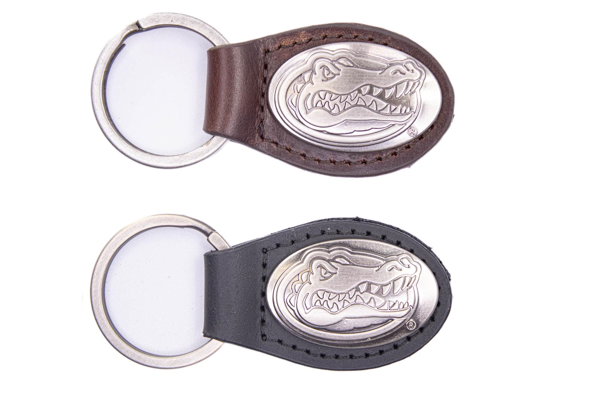 Florida Gators Oval Leather Key Fob. Sturdy Split Ring and Durable Stitching. Perfect Collegiate Key Chain Gift. Brown or Black Leather.