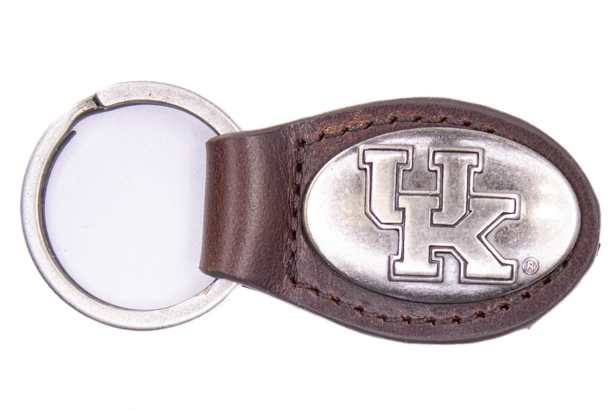 Kentucky Wildcats Oval Leather Key Fob. Sturdy Split Ring and Durable Stitching. Perfect Collegiate Key Chain Gift. Brown or Black Leather.