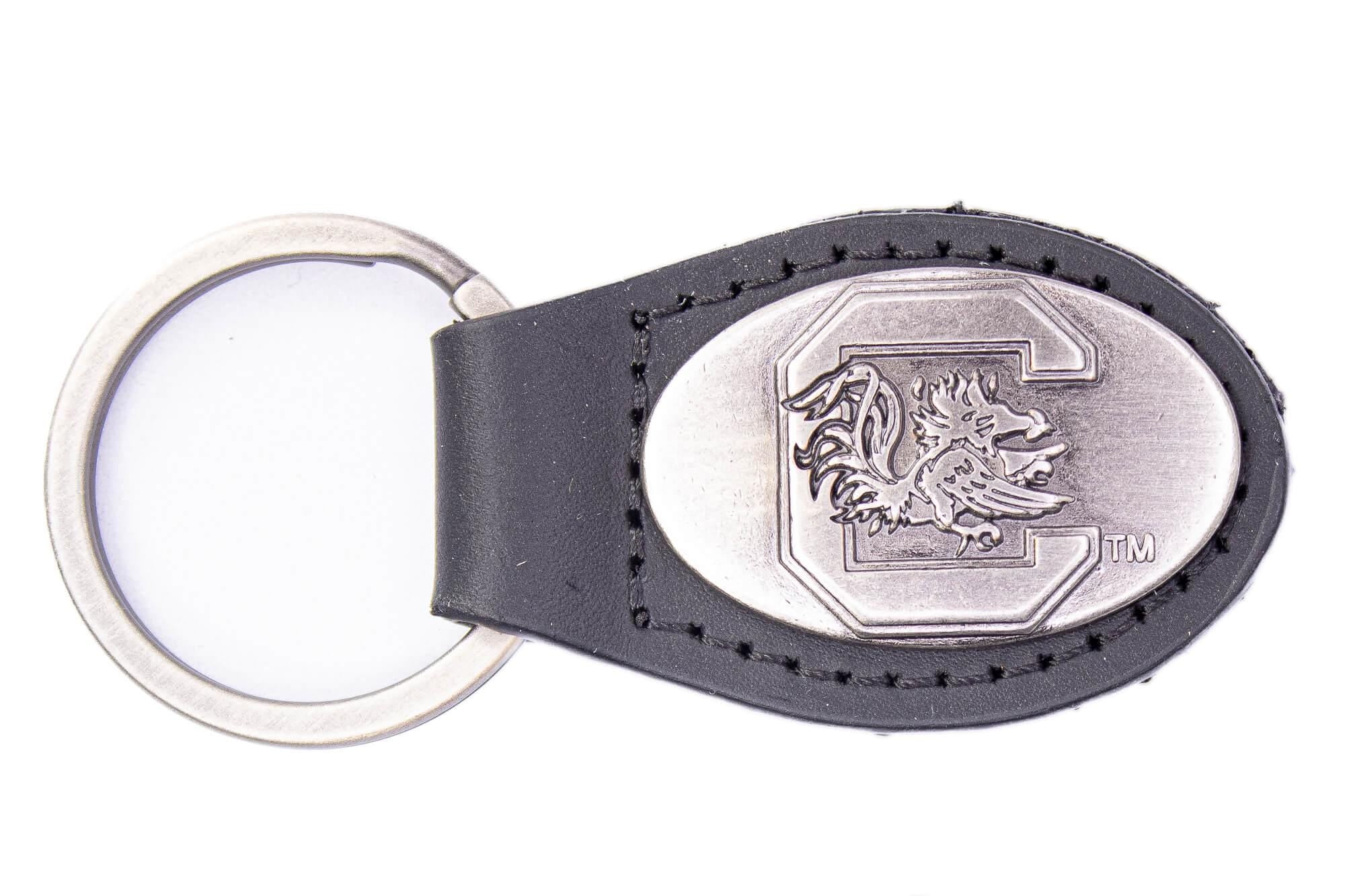 USC Gamecoks Oval Leather Key Fob. Sturdy Split Ring and Durable Stitching. Perfect Collegiate Key Chain Gift. Brown or Black Leather.