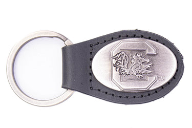 USC Gamecoks Oval Leather Key Fob. Sturdy Split Ring and Durable Stitching. Perfect Collegiate Key Chain Gift. Brown or Black Leather.