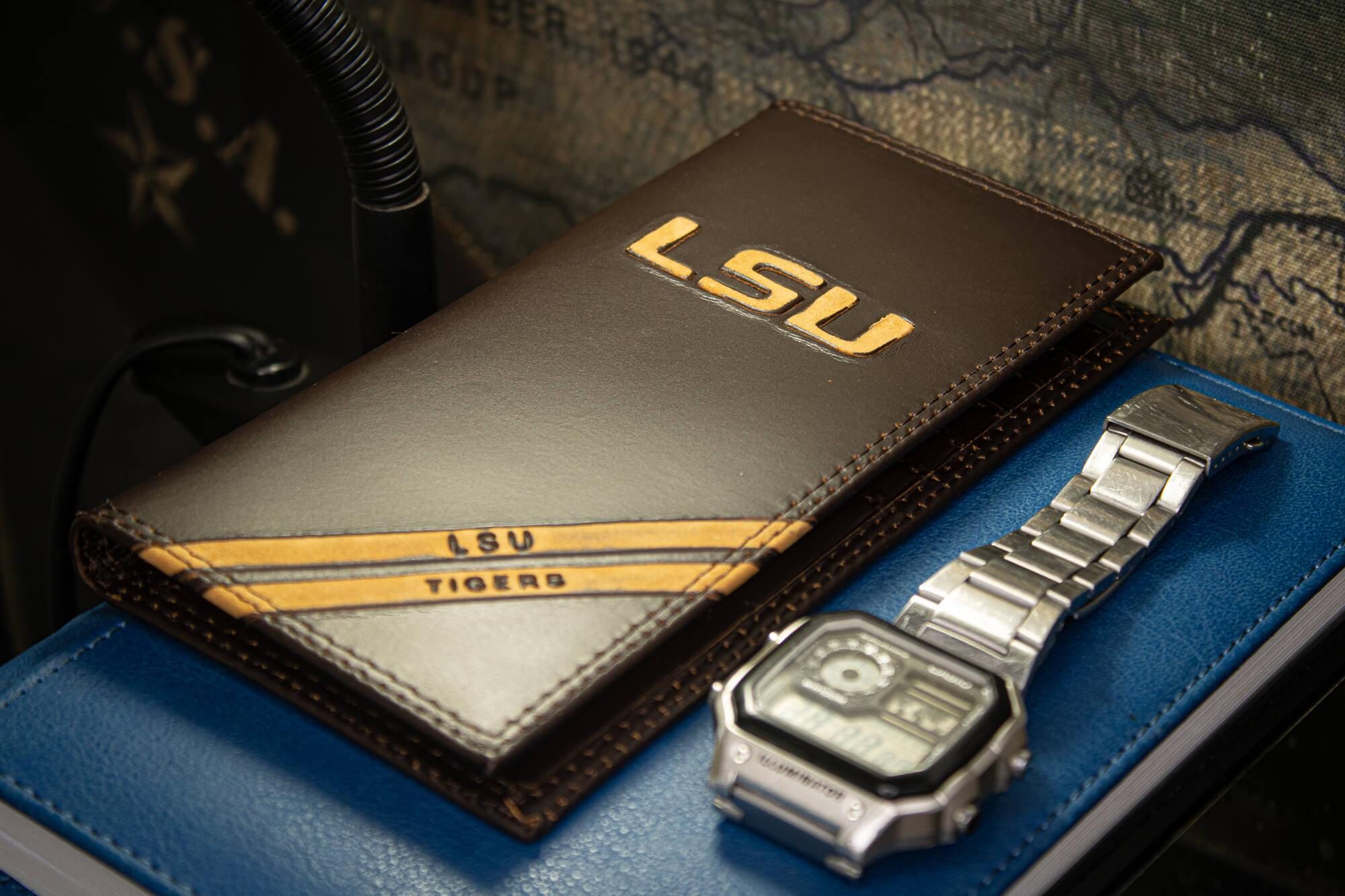 LSU Tigers Men's Embossed Leather Wallet. LSU Trifold. LSU Secretary. Brown Collegiate Wallet. Tigers Athletic Print.
