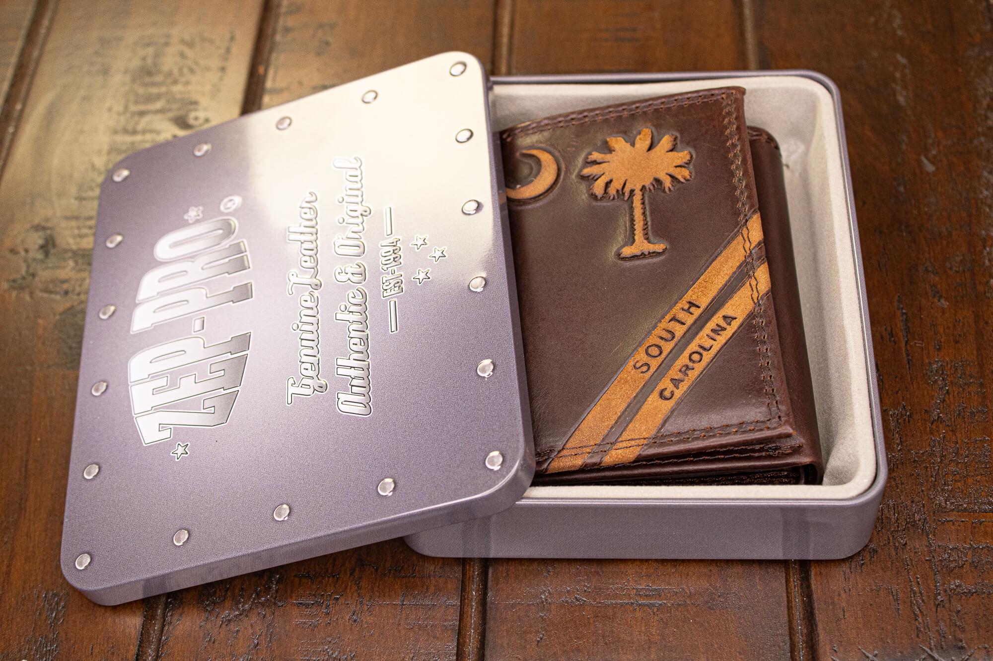 SC Palmetto Moon Men's Embossed Leather Wallet. SC Palmetto Trifold. Carolina Secretary. Brown Collegiate Wallet. Palmetto Athletic Print.