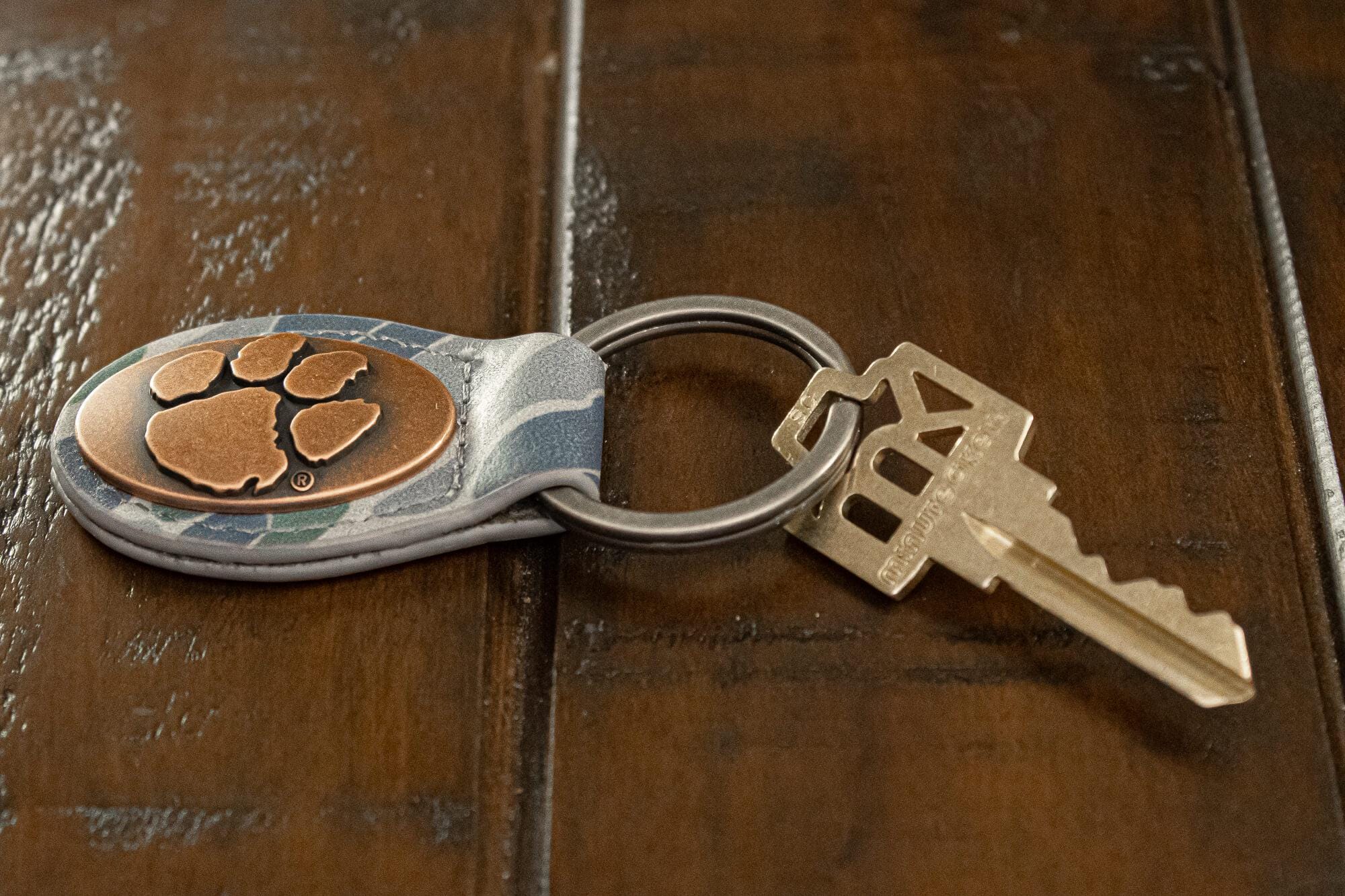 Clemson Tigers Oval Camo Leather Key Fob. Split Ring and Durable Stitching. Perfect Collegiate Key Chain Gift. Old School Camo Key Chain.