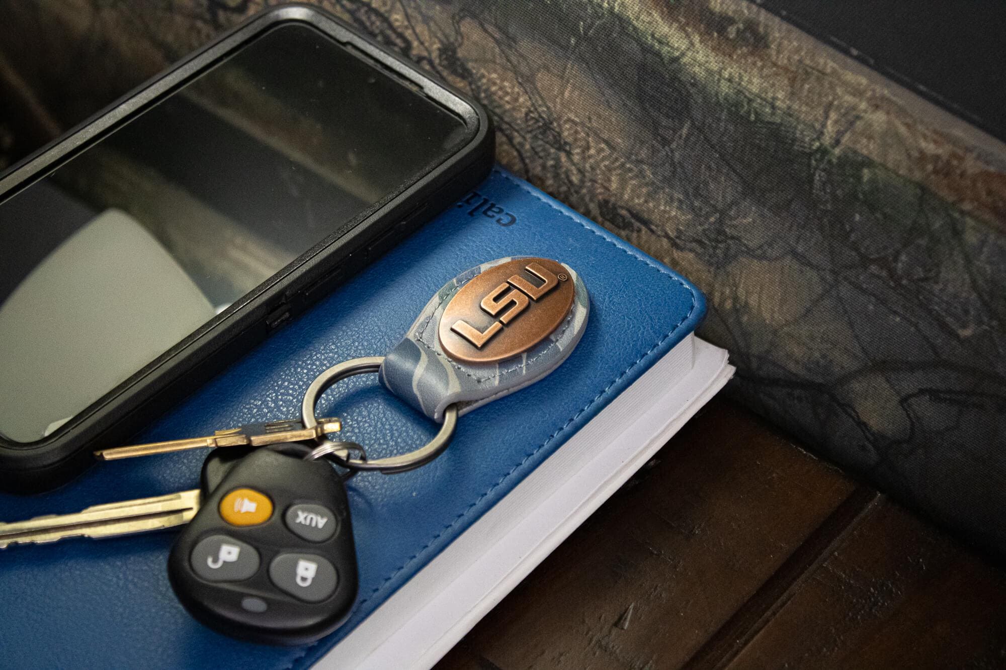 LSU Tigers Oval Camo Leather Key Fob. Split Ring and Durable Stitching. Perfect Collegiate Key Chain Gift. Old School Camo Key Chain.