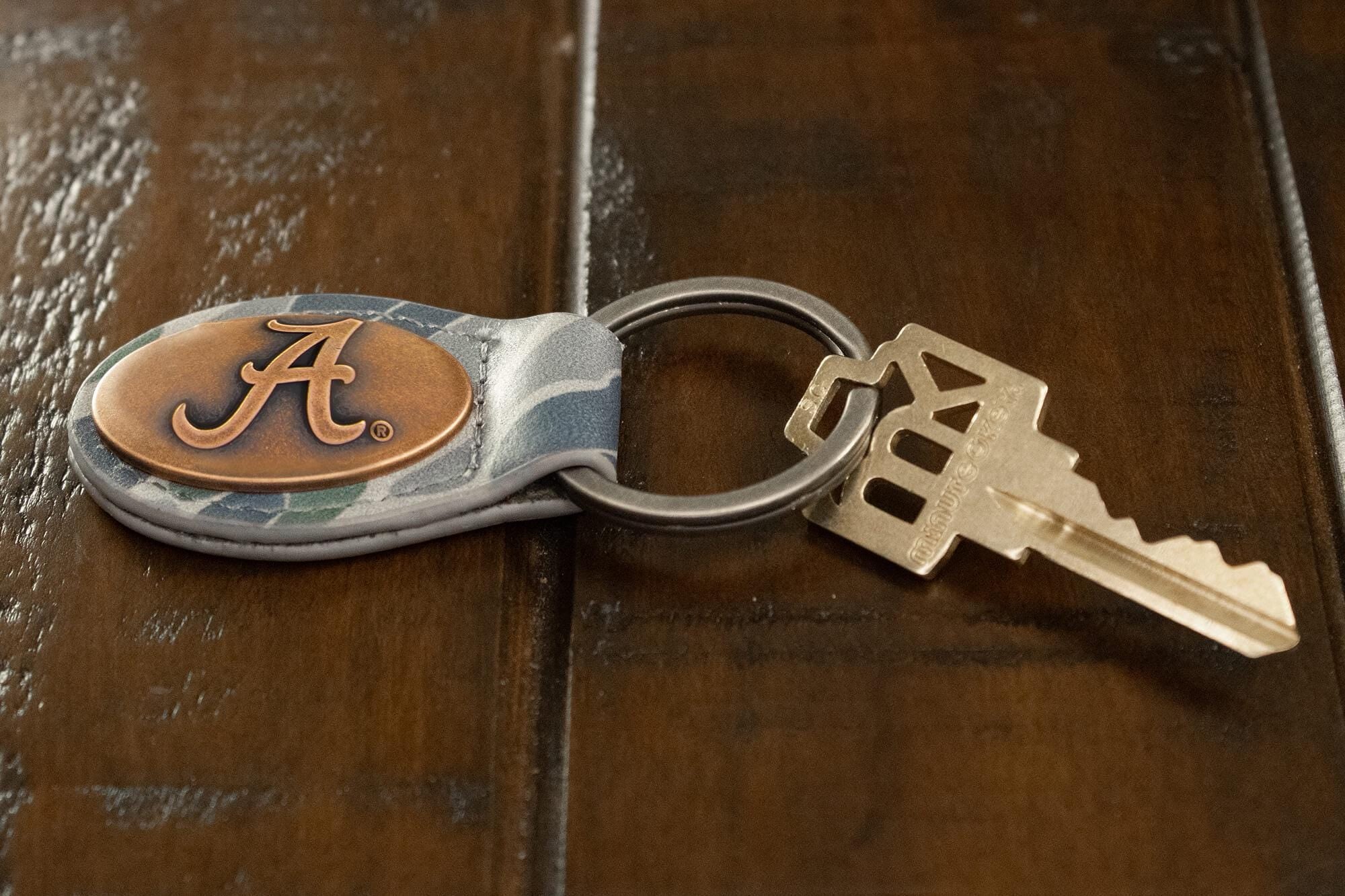 Alabama Crimson Tide Oval Camo Leather Key Fob. Split Ring and Durable Stitching. Collegiate Key Chain Gift. Old School Camo Key Chain.