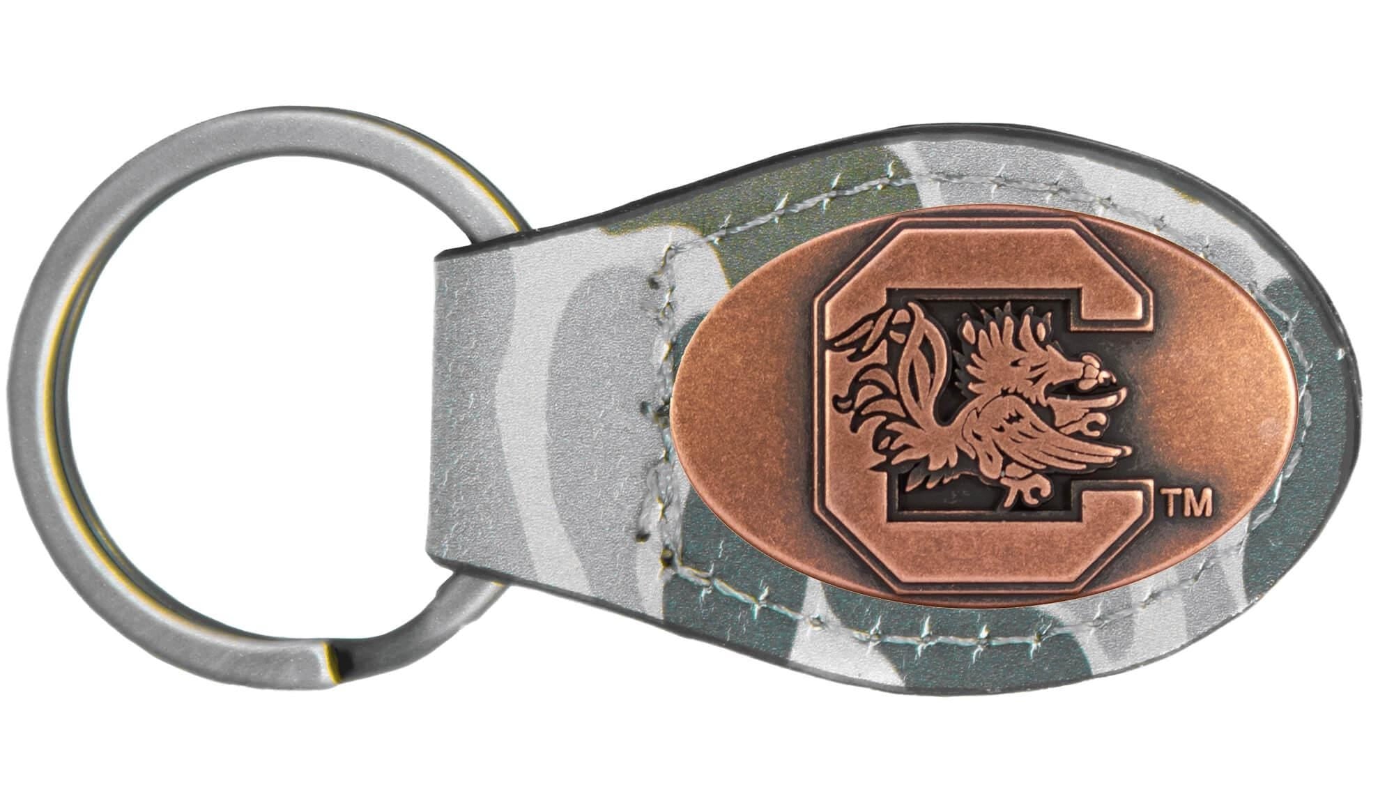 USC Gamecocks Oval Camo Leather Key Fob. Split Ring and Durable Stitching. Perfect Collegiate Key Chain Gift. Old School Camo Key Chain.