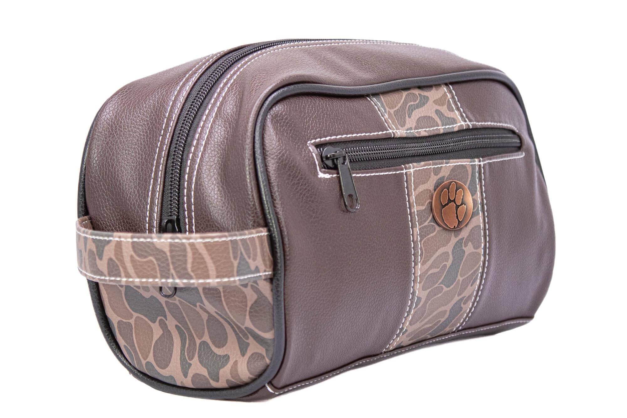 Clemson Tigers Men's Camo Dopp Kit. Toiletry Bag. Old School Camo Print. Brown Pebble Finish. Antique Copper Logo. Perfect Travel Accessory