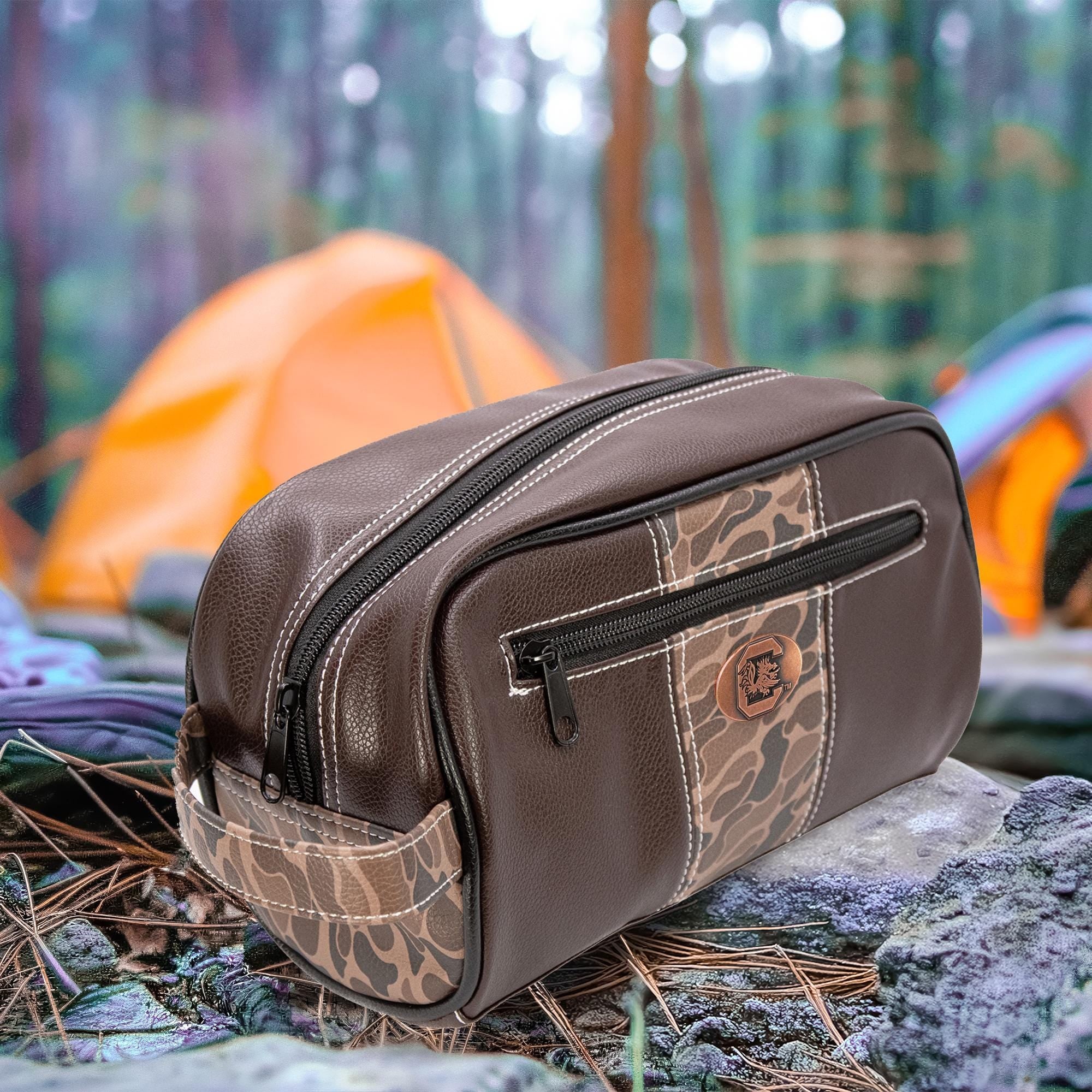 USC Gamecocks Men's Camo Dopp Kit. Toiletry Bag. Old School Camo Print. Brown Pebble Finish. Antique Copper Logo. Perfect Travel Accessory