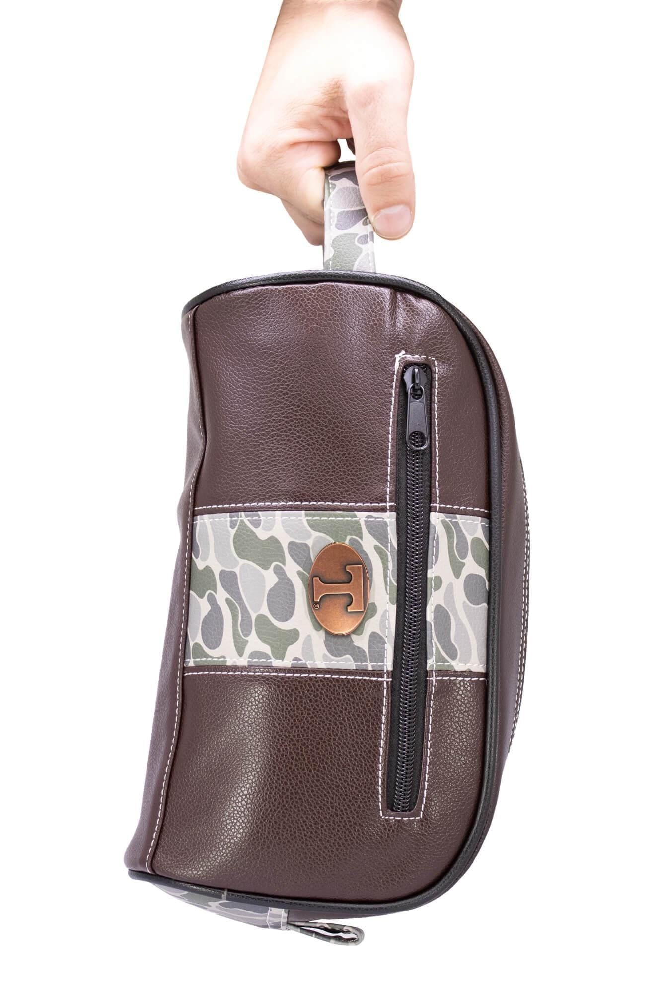 Tennessee Vols Men's Camo Dopp Kit. Toiletry Bag. Old School Camo Print. Brown Pebble Finish. Antique Copper Logo. Perfect Travel Accessory