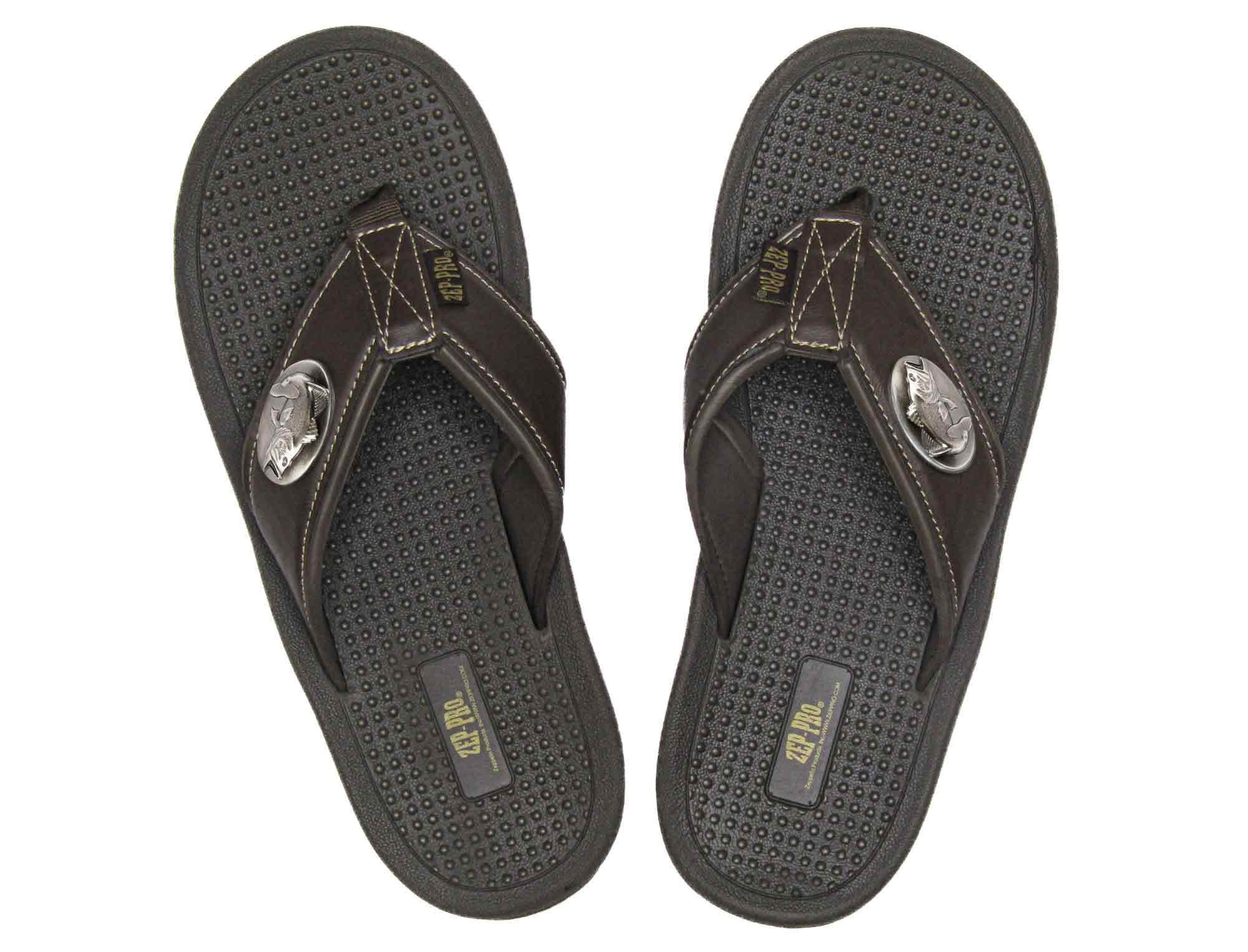 Bass Men's Flip Flop Sandal. Casual Boat Show. Fishing Gift. Brown Straps With Metal Concho Logo. Cushioned Insole and Non-skid Outsole.