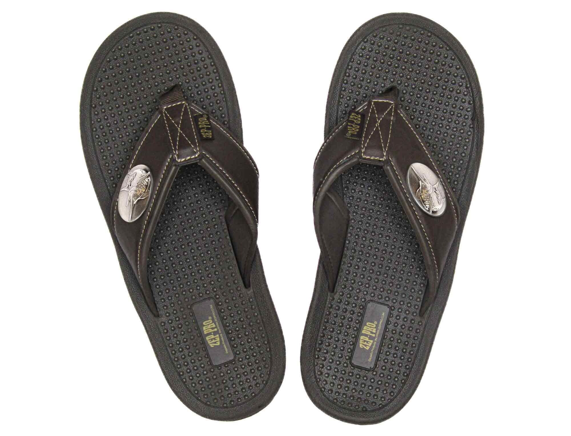 Marlin Men's Flip Flop Sandal. Casual Boat Show. Fishing Gift. Brown Straps With Metal Concho Logo. Cushioned Insole and Non-skid Outsole.