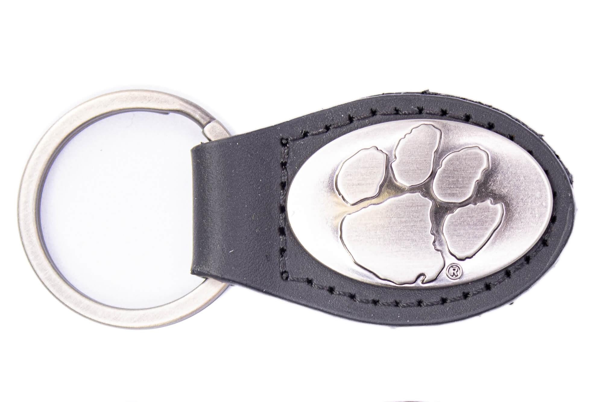 Clemson Tigers Oval Leather Key Fob. Sturdy Split Ring and Durable Stitching. Perfect Collegiate Key Chain Gift. Brown or Black Leather.