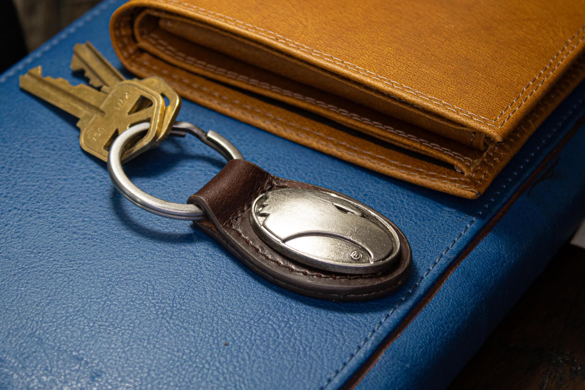 Georgia Southern Eagles Oval Leather Key Fob. Split Ring and Durable Stitching. Perfect Collegiate Key Chain Gift. Brown or Black Leather.