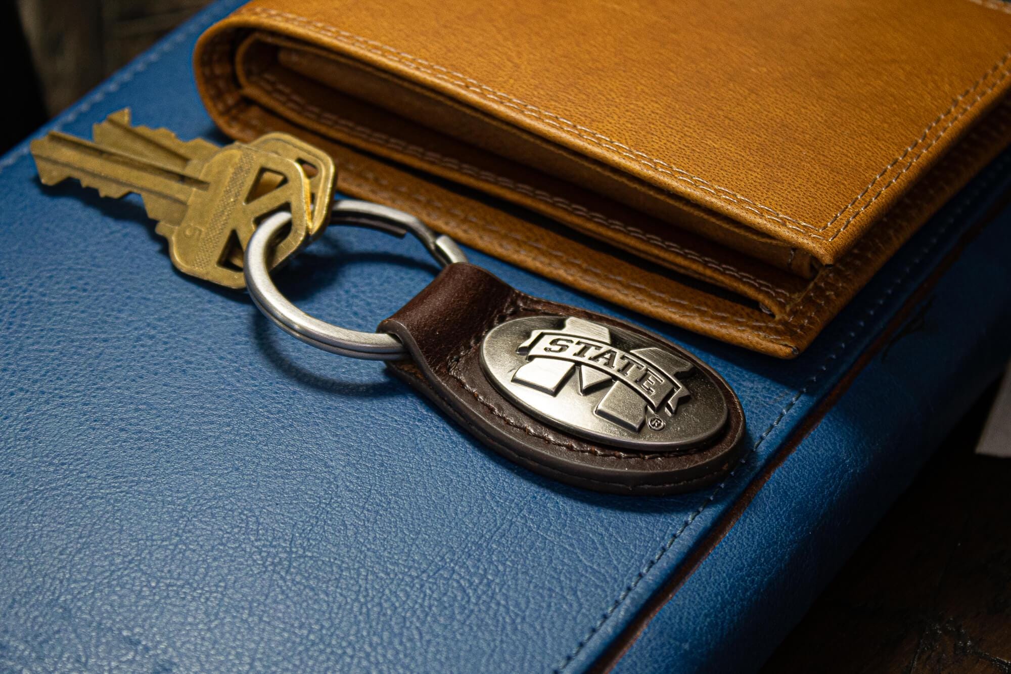 Mississippi State Bulldogs Oval Leather Key Fob. Split Ring and Durable Stitching. Perfect Collegiate Key Chain Gift. Brown or Black Leather
