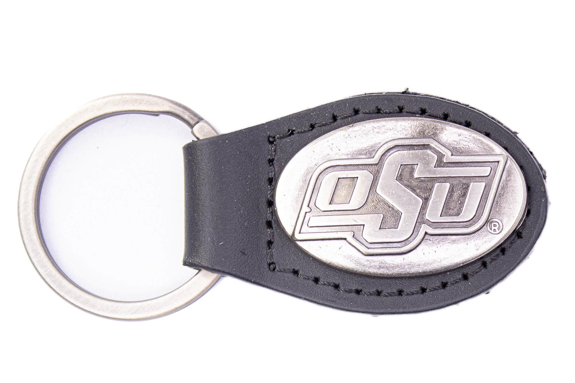 Oklahoma State Cowboys Oval Leather Key Fob. Split Ring and Durable Stitching. Perfect Collegiate Key Chain Gift. Brown or Black Leather.