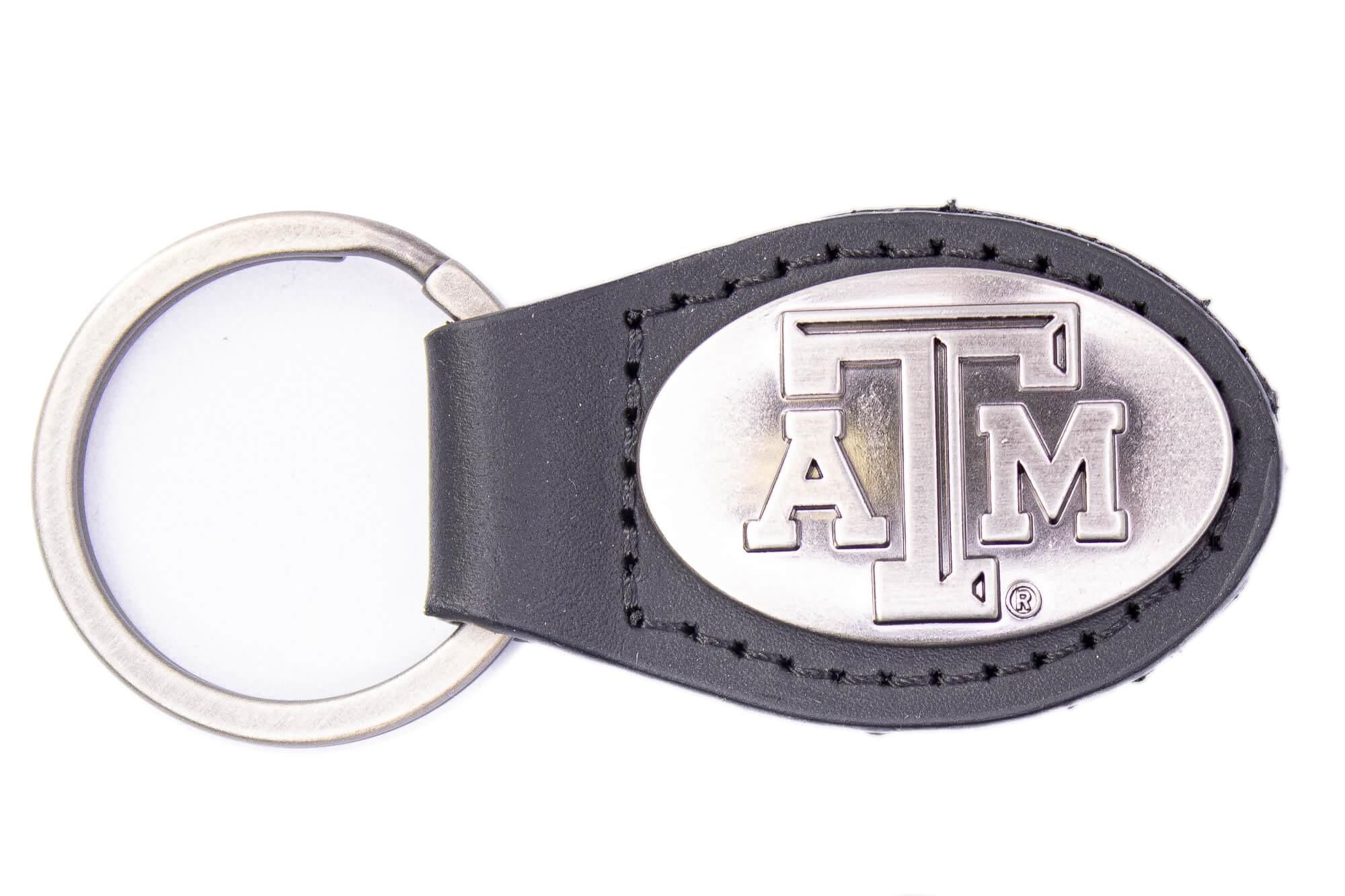 Texas A&M Aggies Oval Leather Key Fob. Sturdy Split Ring and Durable Stitching. Perfect Collegiate Key Chain Gift. Brown or Black Leather.