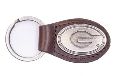 Georgia Bulldogs Oval Leather Key Fob. Sturdy Split Ring and Durable Stitching. Perfect Collegiate Key Chain Gift. Brown or Black Leather.