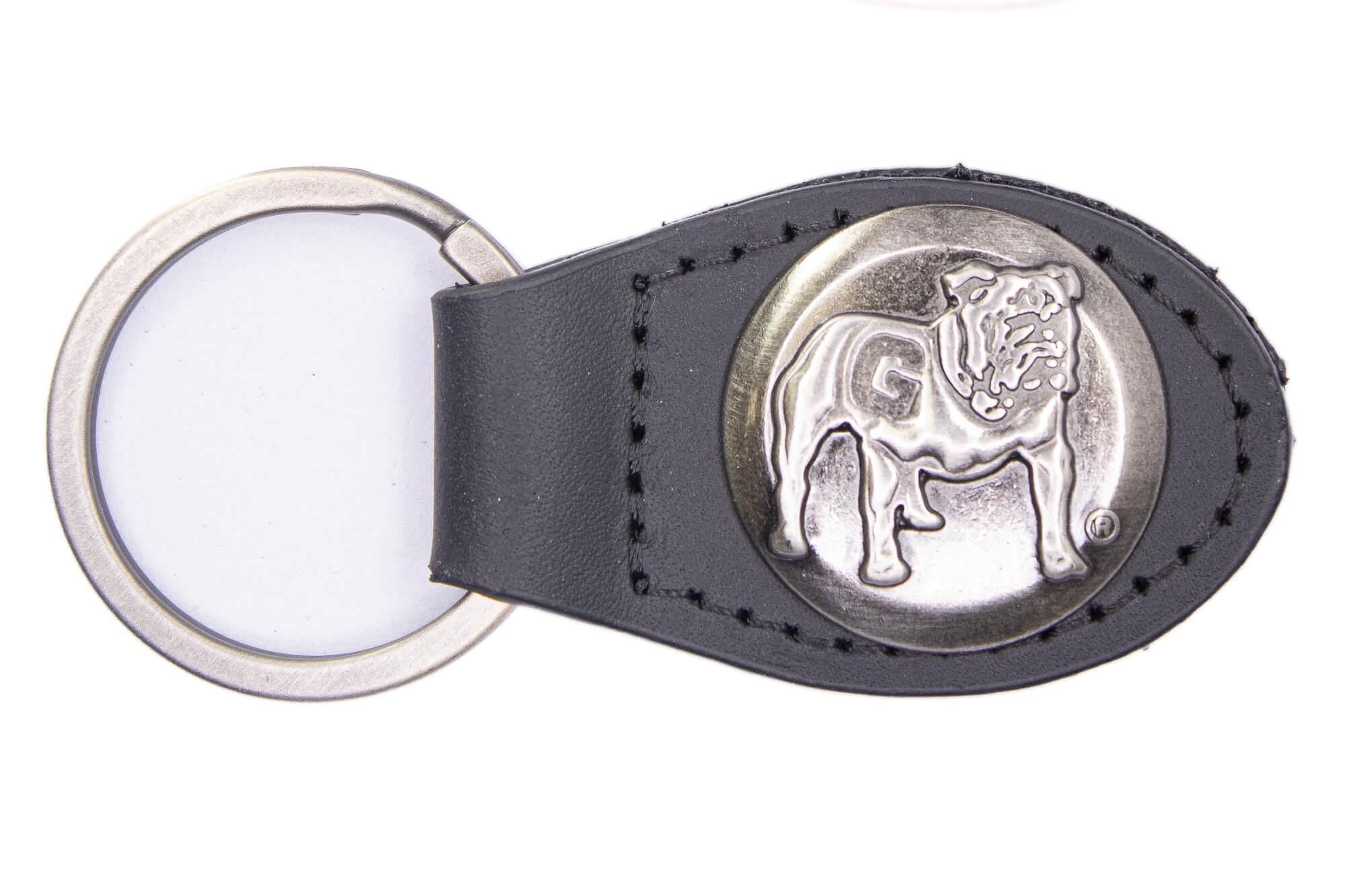 Georgia Bulldogs Oval Leather Key Fob. Sturdy Split Ring and Durable Stitching. Perfect Collegiate Key Chain Gift. Brown or Black Leather.