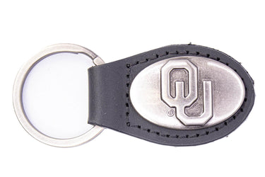 Oklahoma Sooners Oval Leather Key Fob. Sturdy Split Ring and Durable Stitching. Perfect Collegiate Key Chain Gift. Brown or Black Leather.